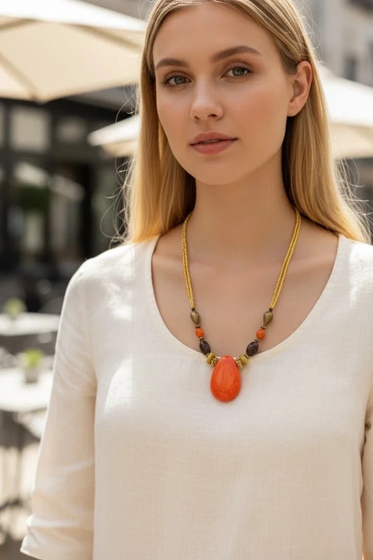 Vintage Bohemian-Style Beaded Necklace with Large Orange Pendant